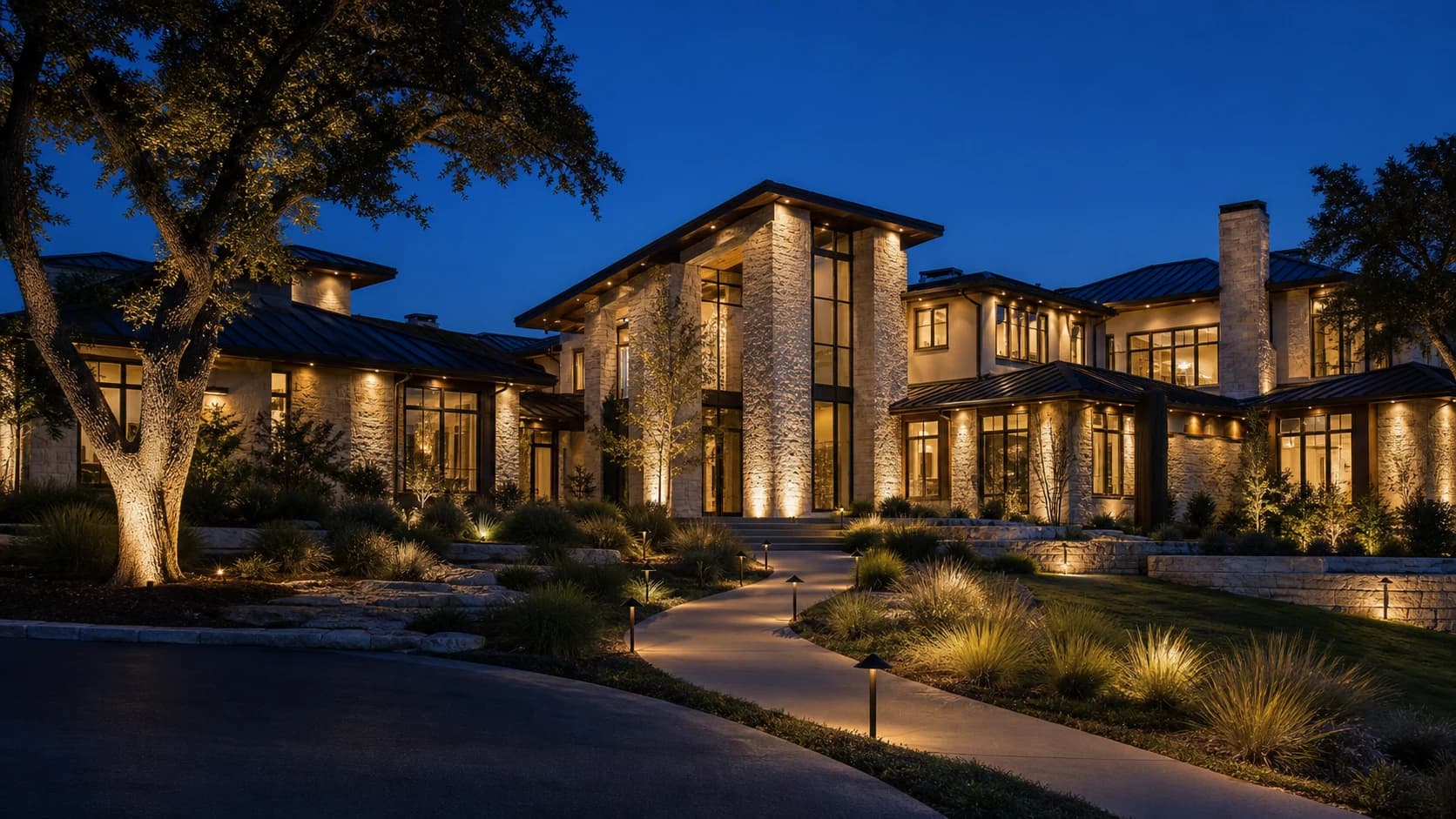 Warm-white landscape lighting on a fictional luxury estate
