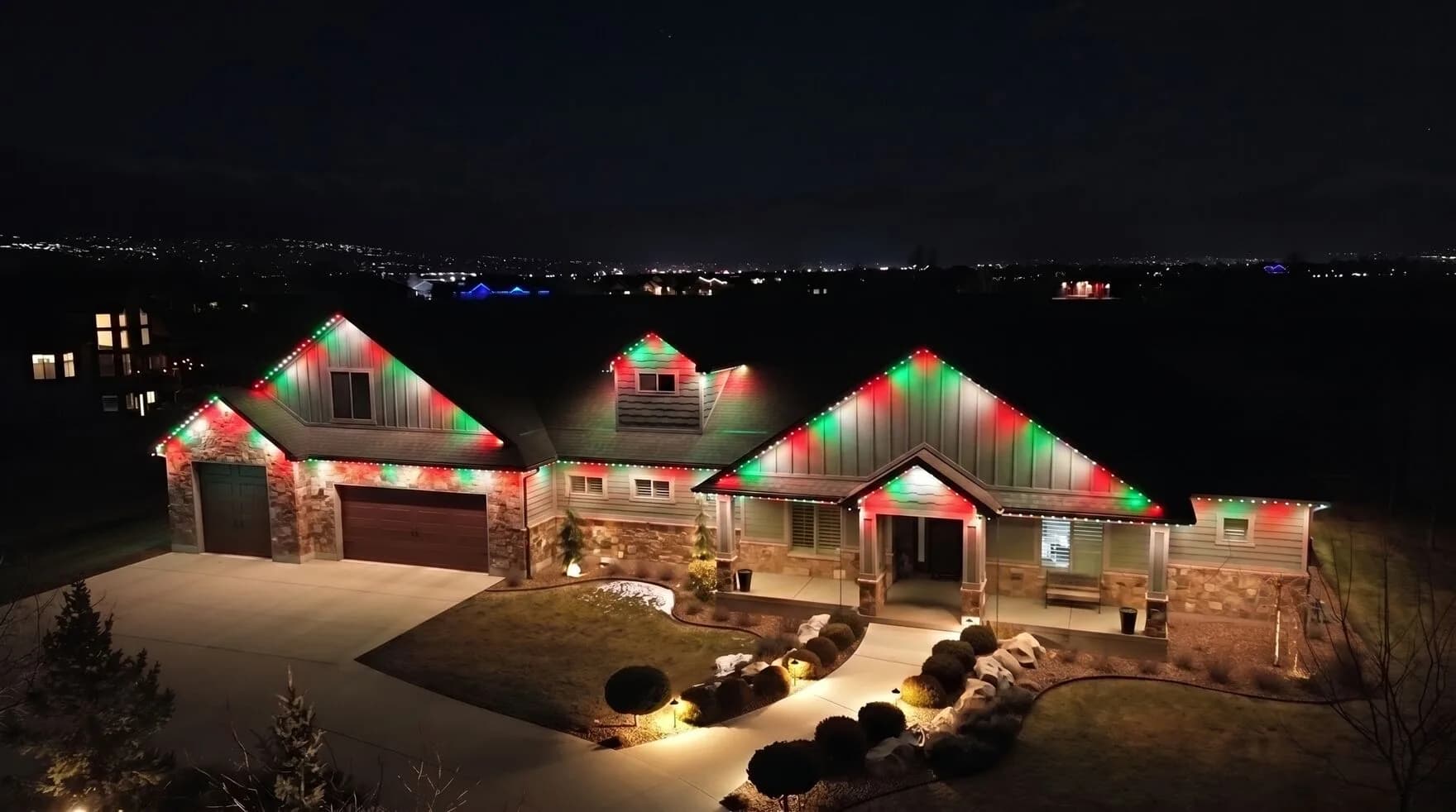 TruLight permanent lighting set to a Christmas pattern on a home (TruLight network scene)
